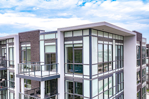 Prestige apartment for sale in Innisfil (Canada) - Modern building facade with glass balconies