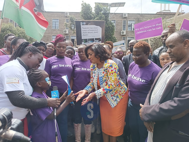 Members of the Brave Movement get ready to start a peaceful march in Nairobi to mark the World Day for Prevention, Healing and Justice to end Childhood Sexual Violence on November 18, 2022.