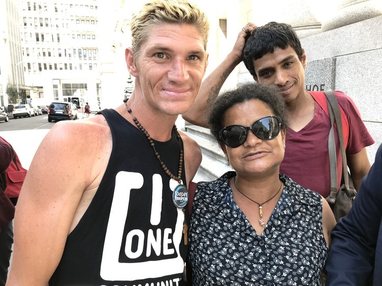 Shaun Strydom, Carin Gelderbloem and Rameez Kemp, who live on the streets in central Cape Town, outside the high court in Cape Town on 12 December 2019