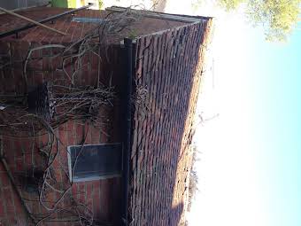 Strip and re-tiled new Kent Peg tiled roof with new velux window. album cover