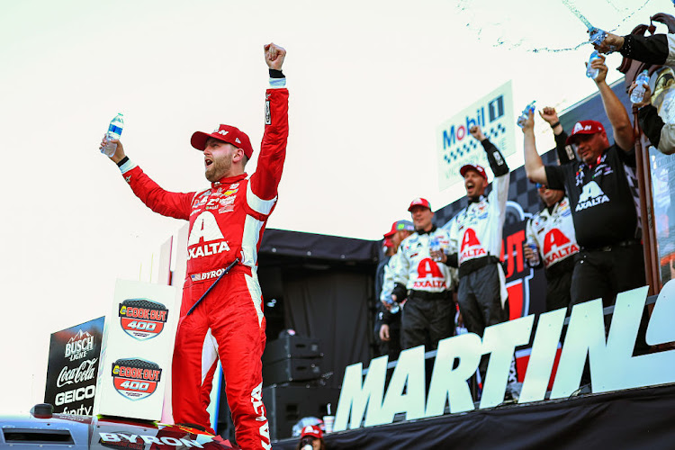 Hendrick Motorsports' William Byron won a two-lap shootout in NASCAR overtime, claiming the Cook Out 400 Cup Series race at Martinsville Speedway in a banner day for owner Rick Hendrick's stable of drivers.