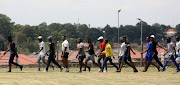 Some of the potential recruits the Department of Community Safety is looking for during a fitness test.  