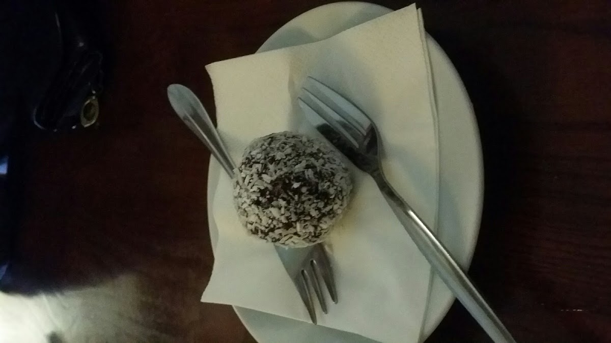 GF dessert "power ball" of chocolate and fruit. Way better than we expected. Light and not overly sweet.