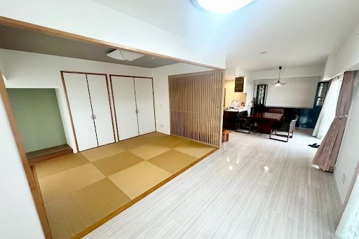 Japanese living room with tatami mats and sliding doors - Buy this luxury apartment / penthouse in Naha, 1 bedroom