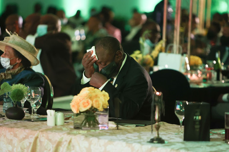 ANC President Cyril Ramaphosa wipes sweat from his brow before delivering the keynote address at the Ranch Resort, near Polokwane, Limpopo, during the ANC gala dinner and fundraiser on January 7 2022.