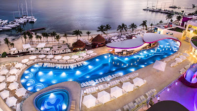 A look at the sexy pool at dusk from the Tower at Temptation Cancun Resort. 