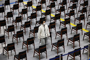 A man arrives to get a dose of the Pfizer-BioNTech coronavirus disease (Covid-19) vaccine at a COVID-19 vaccination center on the last day of its operation in Seoul, South Korea, October 29, 2021.    