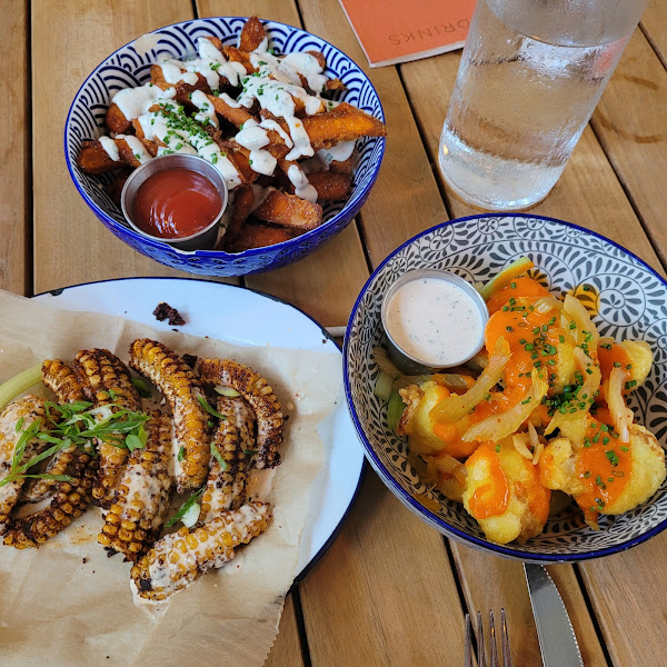 Corn ribs,  sweet potatoe fries and cauliflower wings