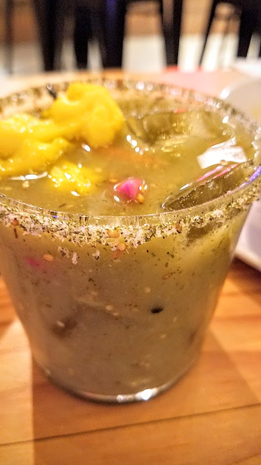 Brunch at Pine Street Market includes 3 bloody mary options, this one is from Shalom Y'all, offering Shalom Mary with vodka, tomatillo, cucumber, celery, s’hug, za’atar salt