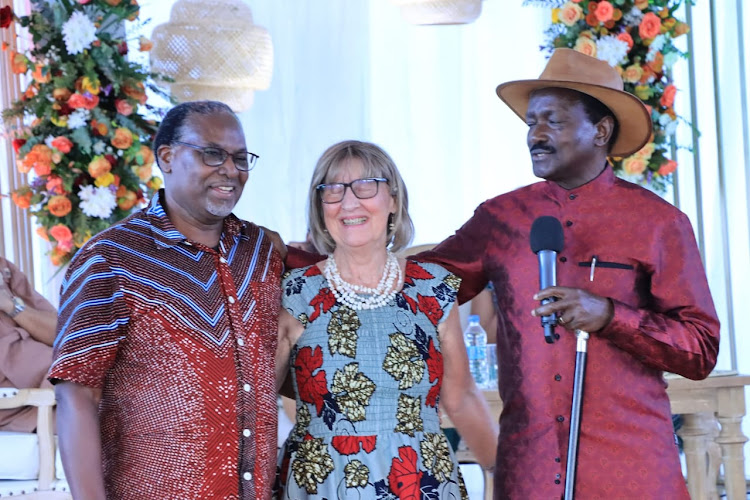 Wiper leader Kalonzo Musyoka (right) with some of the guests during the wedding ceremony on May 11, 2024.