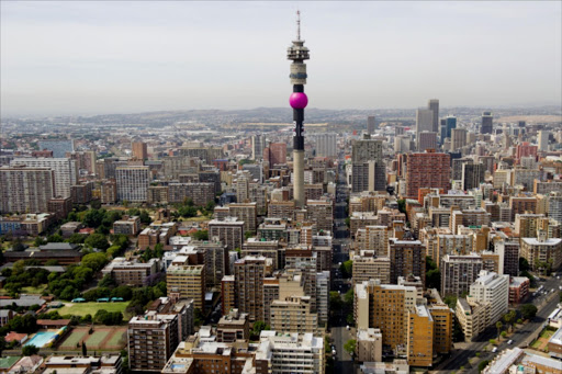 The newly branded Telkom Tower in Hillbrow, Johannesburg, South Africa on October 14, 2011. 8EITA, the cellphone company is celebrating their first birthday today. To mark the occasion they branded the soccer ball on the Telkom Tower in Pink. (Photo by Gallo Images / City Press / Herman Verwey)