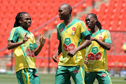 A file photo of Siphiwe Tshabalala, Morgan Gould and Reneilwe Letsholonyane during the Bafana Bafana training session at the Rand Stadium on November 10, 2009 in Johannesburg, South Africa. 