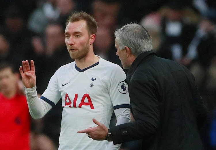 Tottenham Hotspur manager Jose Mourinho with Christian Eriksen