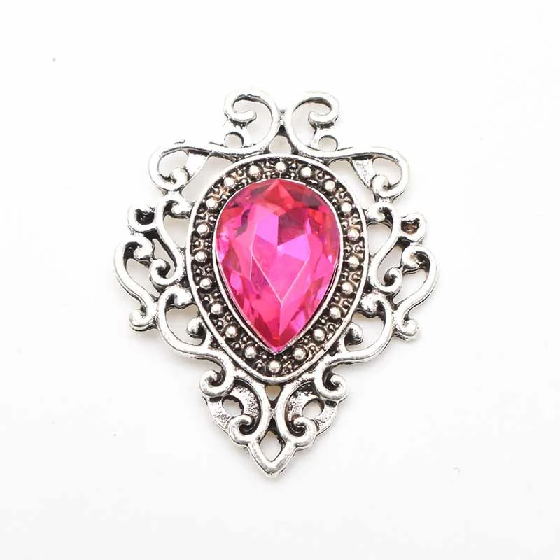 Broche fleur en alliage d'argent antique avec goutte d'eau en gemme, un accessoire élégant pour sublimer votre tenue au quotidien.