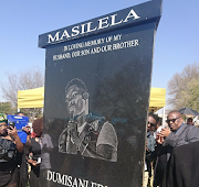 One side of Dumi Masilela's rotating tombstone