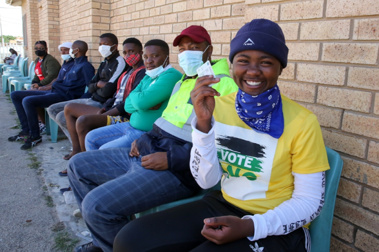 First-time voter Sinoxolo Dayimami, 18, queues to cast her vote at Kwamagxaki High School in Gqeberha. The recent local government elections were not super-spreaders of Covid-19 infections, says the minister of health. File photo.