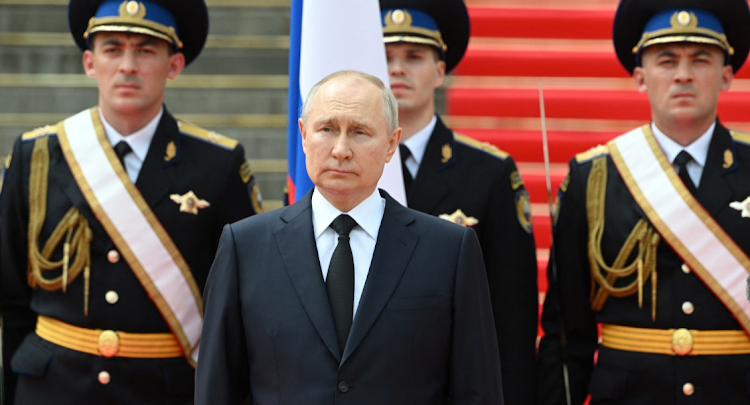 Russian President Vladimir Putin stands in front of members of Russian military units, the National Guard and security services during his address to pay honour to the armed forces in Cathedral Square at the Kremlin in Moscow, Russia, on June 27 2023. Picture: SPUTNIK/POOL via REUTERS