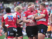 Malcolm Marx of the Emirates Lions celebrates teammates after scoring a try during a Super Rugby semifinal match against the Waratahs at Ellis Park Stadium, Johannesburg on July 28 2018.