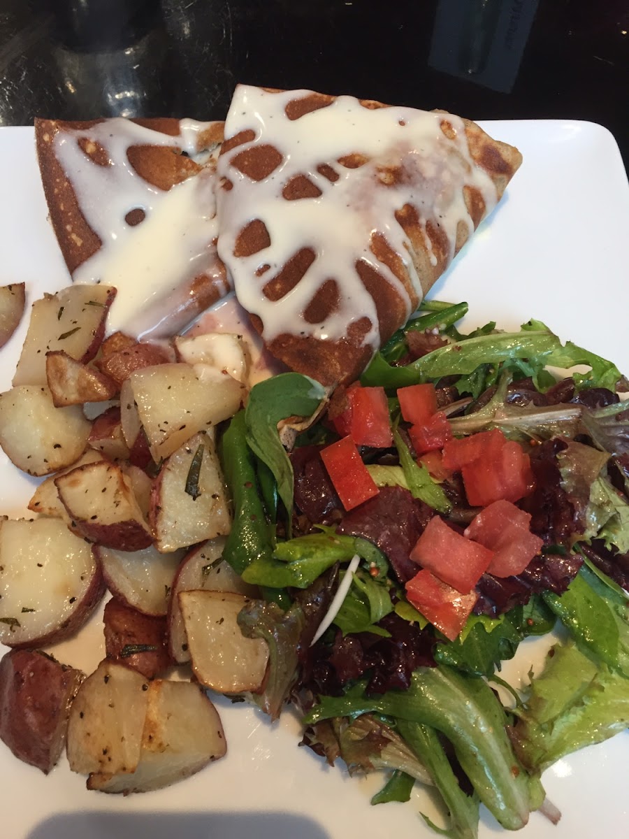 Ham, Egg & Cheese Crepe. Rosemary potatoes & house salad w/ tarragon vinaigrette. Ah. Ma.Zing!