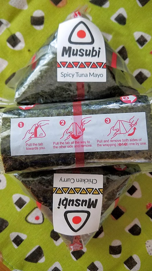 Musubi in Portland, the onigiri is carefully packaged in plastic with a red strip guiding you how to open it- and it keeps it separate so the seaweed stays crispy and dry away from the more moist rice portion until the moment of consumption and you bring it together.