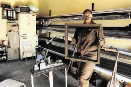 SKILLS DO THE TALKING: In what used to be the male-dominated world of aluminium manufacturing, Marcia Mofokeng is making a name for herself and her company - and earning a handsome living photo: peter mogaki