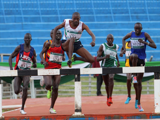 Benjamin Kigen taking charge in Men 3000M steeple chase Final..JPG