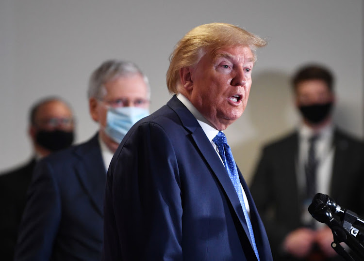 US President Donald Trump speaks to members of the media following the weekly Senate Republican caucus luncheon at the Hart Senate Office Building in Washington, D.C., US, on Tuesday, May 19, 2020.