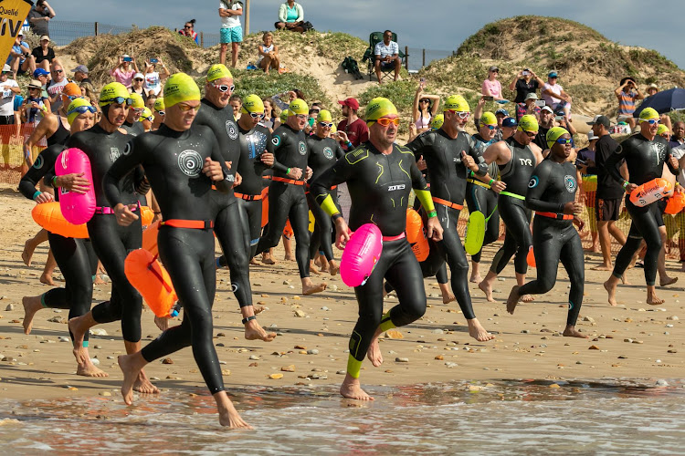 Swimmers head off into the Indian Ocean for the 13th Nelson Mandela Bay Bellbuoy Challenge on Saturday