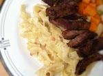 Strip Steaks Over Noodles was pinched from <a href="http://redbeansanderic.com/?p=1531" target="_blank">redbeansanderic.com.</a>