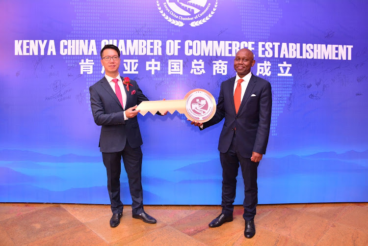 Tim Chen Chairman of Kenya China Chamber of Commerce with Julius Opiyo Chairman Kenya National Chamber of Commerce at the launch