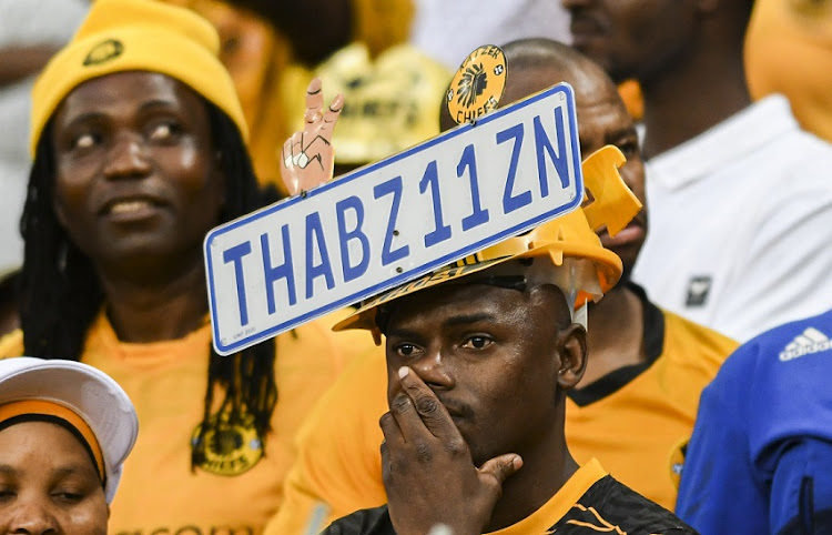 Dejected Kaizer Chiefs fans watch their team's second leg of their MTN8 semifinal against AmaZulu at Moses Mabhida Stadium in Durban on October 23 2022.