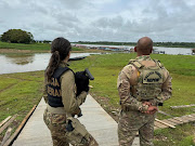 Federal Police officers conduct a raid in a port during the Turquesa Operation, in Benjamin Constant Brazil November 30, 2023. 