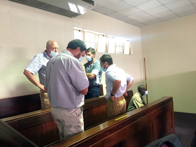 The men accused of the murder of Coka brothers Mgcini and Zenzele in court. File photo.