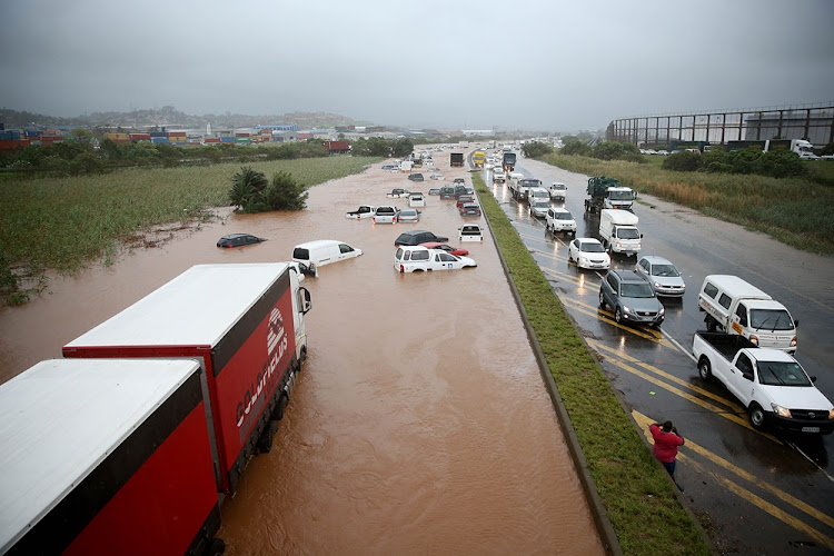 Vehicles stuck in high storm water in Prospecton Road, south of Durban on October 10, 2017.