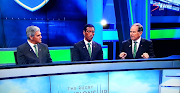 SuperSport's rugby analysts Nick Mallett (L), Ashwin Willemse (C) and Naas Botha doing a live studio analysis. The trio was put off air after a controversial scene in which Willemse walked off studio during a live analysis. 