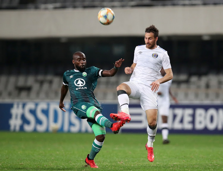 Makhehleni Makhaula of AmaZulu challenged by Bradley Grobler of Supersport United.