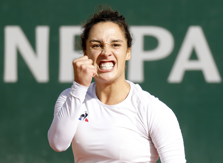 Martina Trevisan celebrates during her fourth round match against Netherlands' Kiki Bertens.