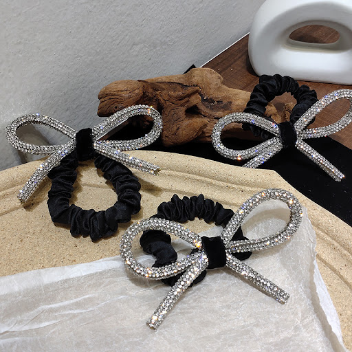 Title 7, Shiny diamond-studded bow hair tie, an elegant ...