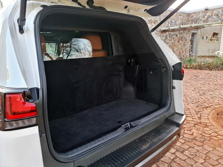 An armoured rear bulkhead,complete with an escape hatch, is neatly integrated behind the vehicle's second row of seats.