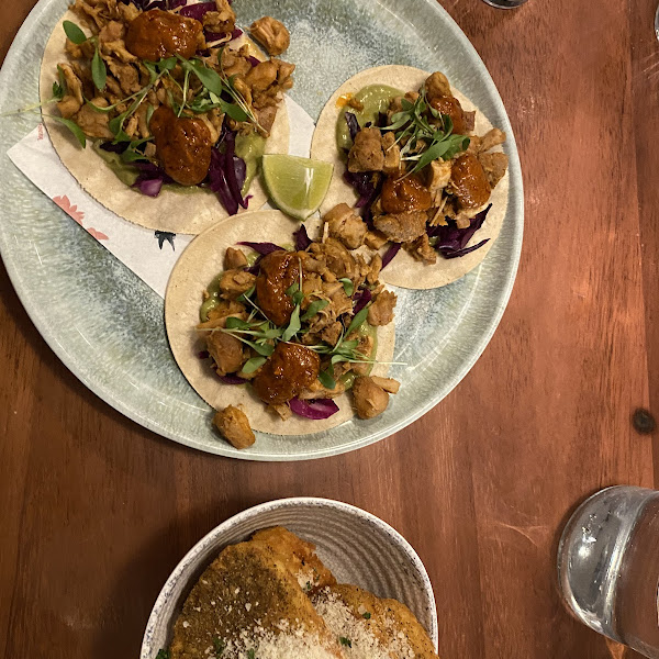 Chicken tacos and garlic and herb hash browns