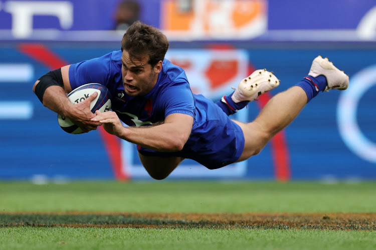 Damian Penaud scores France's fifth try in their 2023 Summer International Test against Australia at Stade de France on Sunday.