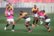 Handré Pollard and Lukhanyo Am during the Springbok captain's run at Nelson Mandela Bay Stadium in Gqeberha.