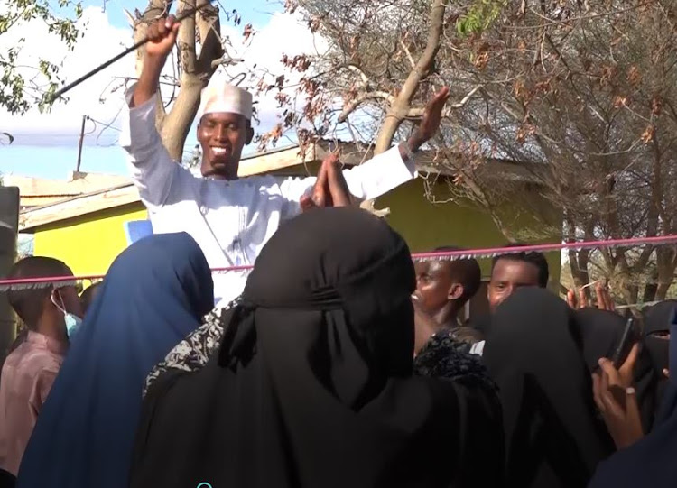 Suleiman Salat is lifted shoulder high by his supporters in Garissa on Saturday. he has declared interest for the Garissa township parliamentary seat.