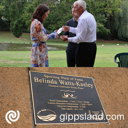 Belinda Watts-Keeley while accepting her trophy