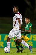 Vusi Sibiya of Stellenbosch FC and Pule Mmodi of Golden Arrows FC during the DStv Premiership match between Golden Arrows and Stellenbosch FC at Princess Magogo Stadium on October 14, 2022 in Durban.