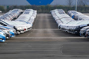 Newly manufactured Nissan vehicles sit parked at the company's factory in Sunderland, UK, on Tuesday, on March 24 2020. Nissan suspended production at the plant as the rapidly spreading coronavirus outbreak inflicts increasingly greater economic pain.