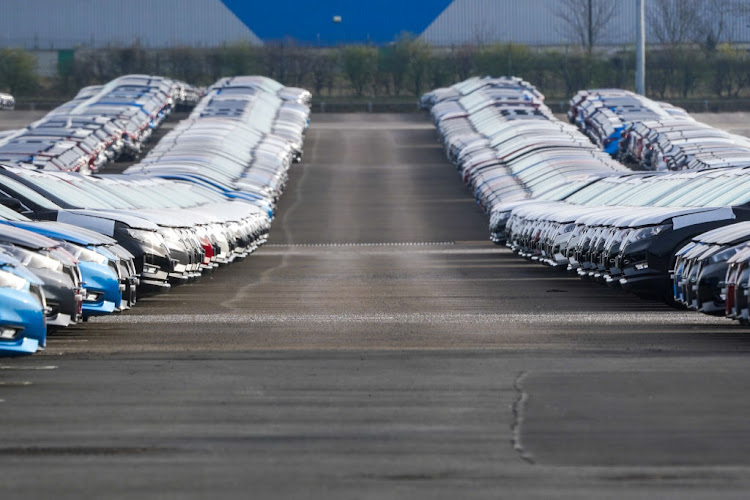 Newly manufactured Nissan vehicles sit parked at the company's factory in Sunderland, UK, on Tuesday, on March 24 2020. Nissan suspended production at the plant as the rapidly spreading coronavirus outbreak inflicts increasingly greater economic pain.