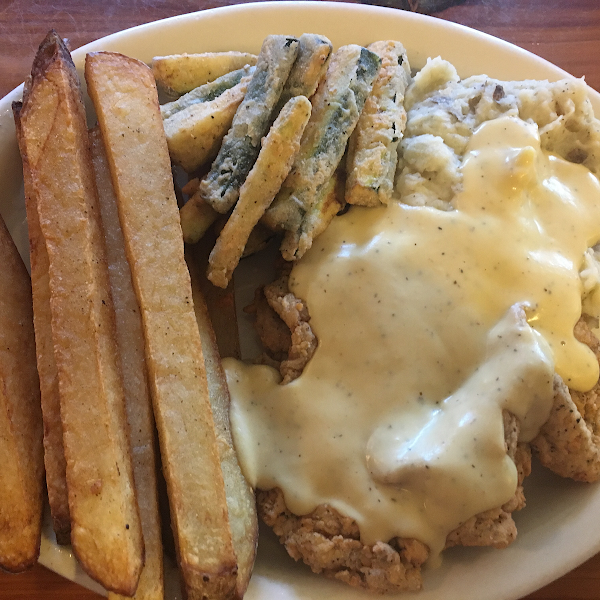 Gluten free chicken fried steak, gf cream gravy, gf fried zucchini, mash potatoes and fries. lunch portion. DELICIOUS 

I always call 30 mins ahead to allow them time to start the dedicated fryer.