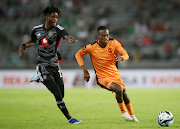 Thabang Matuludi of Polokwane City challenged by Karim Kimvuidi of Orlando Pirates during the DStv Premiership 2023/24 match at  Orlando Stadium, Soweto on the 27 October 2023.