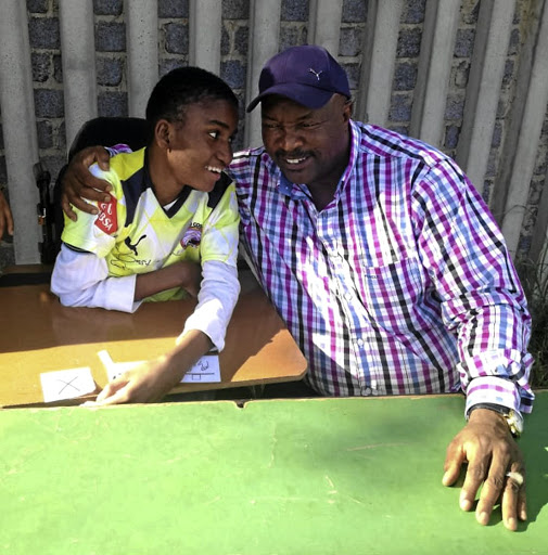 Qhayiya Ngcaku delighted to meet football legend and club owner Jomo Sono.